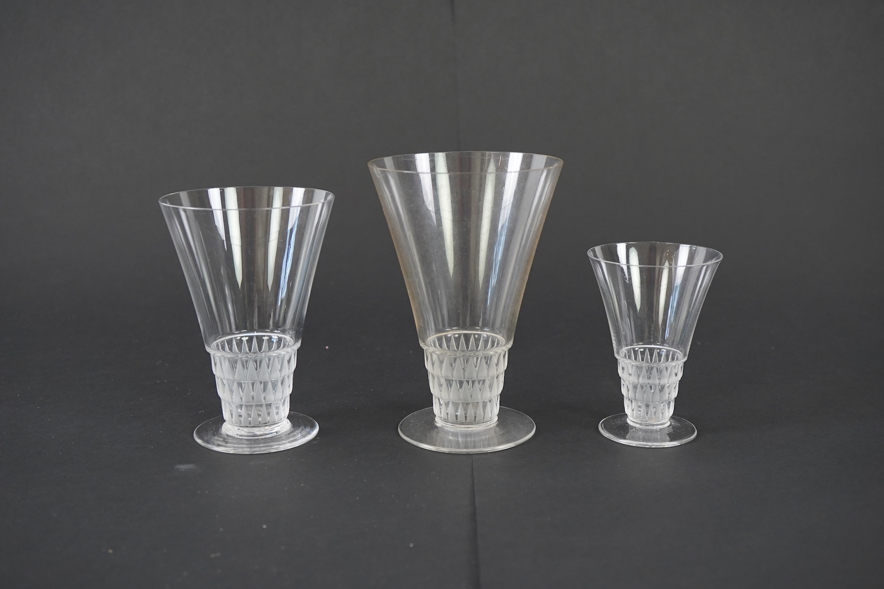 Lalique: A suite of 'Bourgueil' pattern drinking glasses